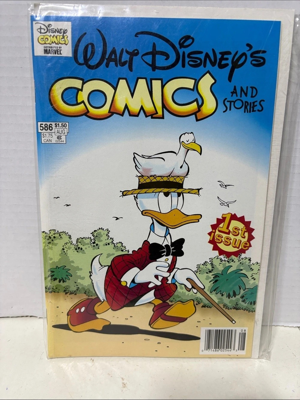 Disney Walt Disney's Comics and Stories #586 1st Issue Comic in Blue & Yellow